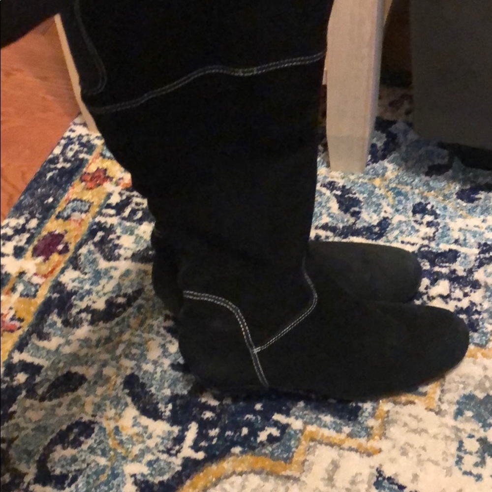 Black suede boots with beautiful white trim